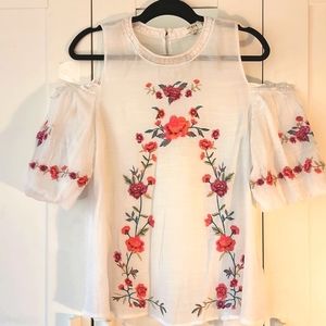 Floral cut-out shoulder blouse.  Perfect for summer